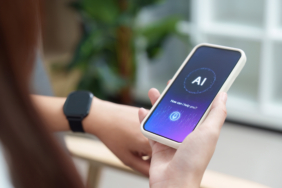 AI Assistance. User engaging with AI on smartphone for support.