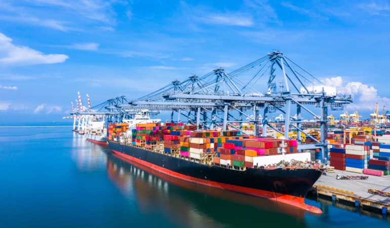Container cargo ship at industrial port in import export busines